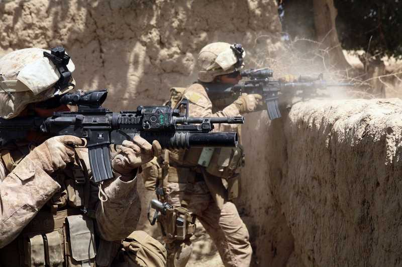 1280px-US_Marines_firing_M4s_in_Helmand_province_Afghanistan_2019-09-17.jpg